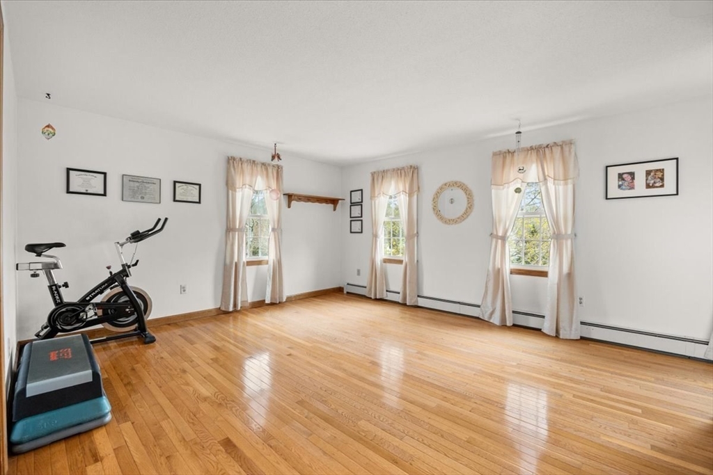 34 Windsor Way Mashpee, MA 02649 - Photo 31 of 42 a view of a room with gym equipment