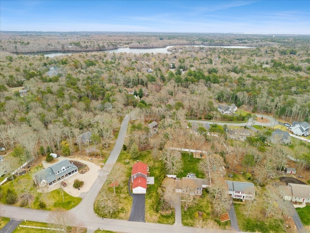 34 Windsor Way Mashpee, MA 02649 - Photo 38 of 42 an aerial view of residential houses with outdoor space