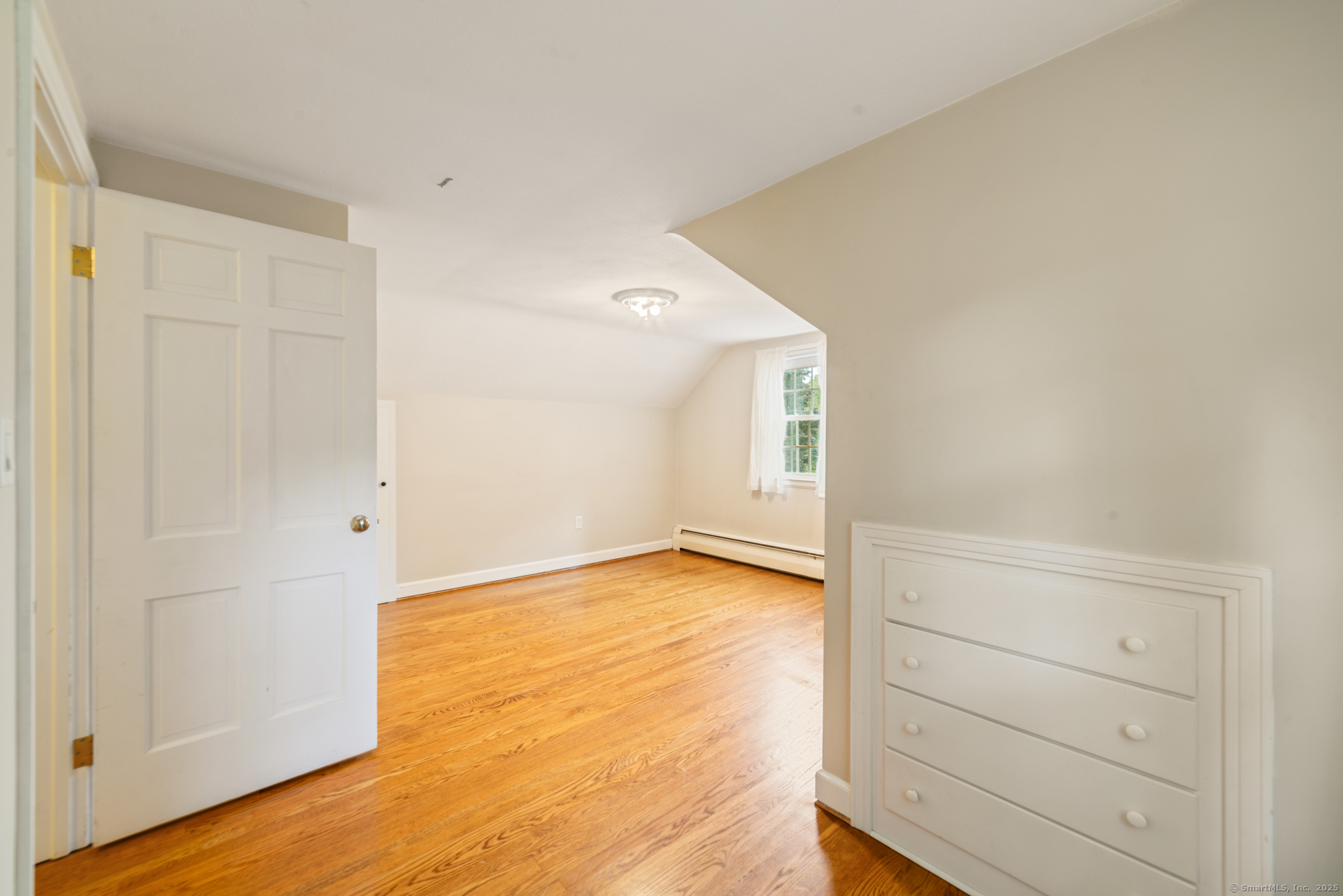 80 Dryden Drive Meriden, CT 06450 - Photo 13 of 23 a view of an empty room and wooden floor