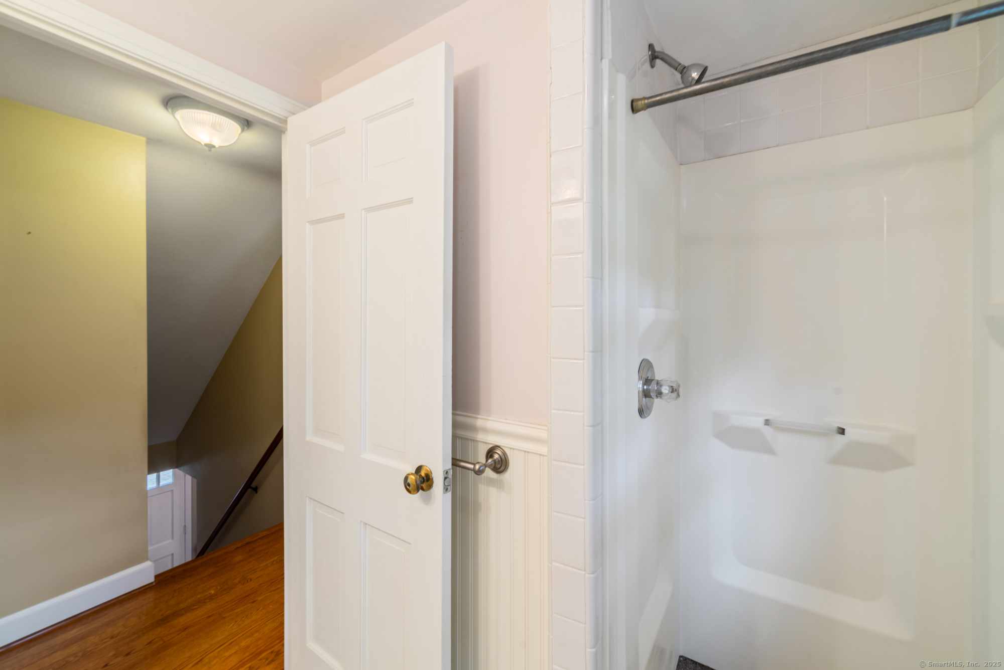 80 Dryden Drive Meriden, CT 06450 - Photo 15 of 23 a bathroom with a glass shower door