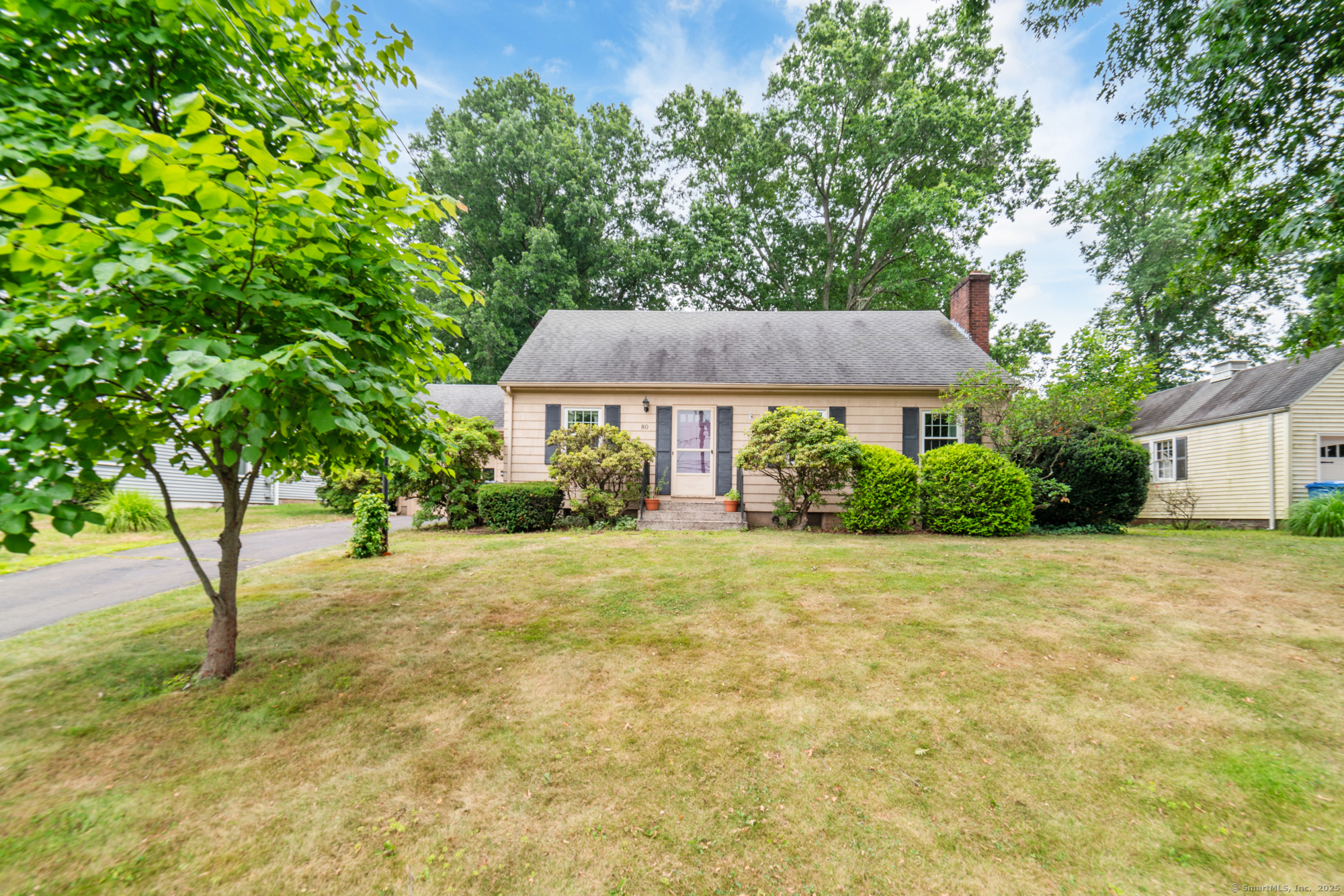 80 Dryden Drive Meriden, CT 06450 - Photo 2 of 23 a house with trees in the background