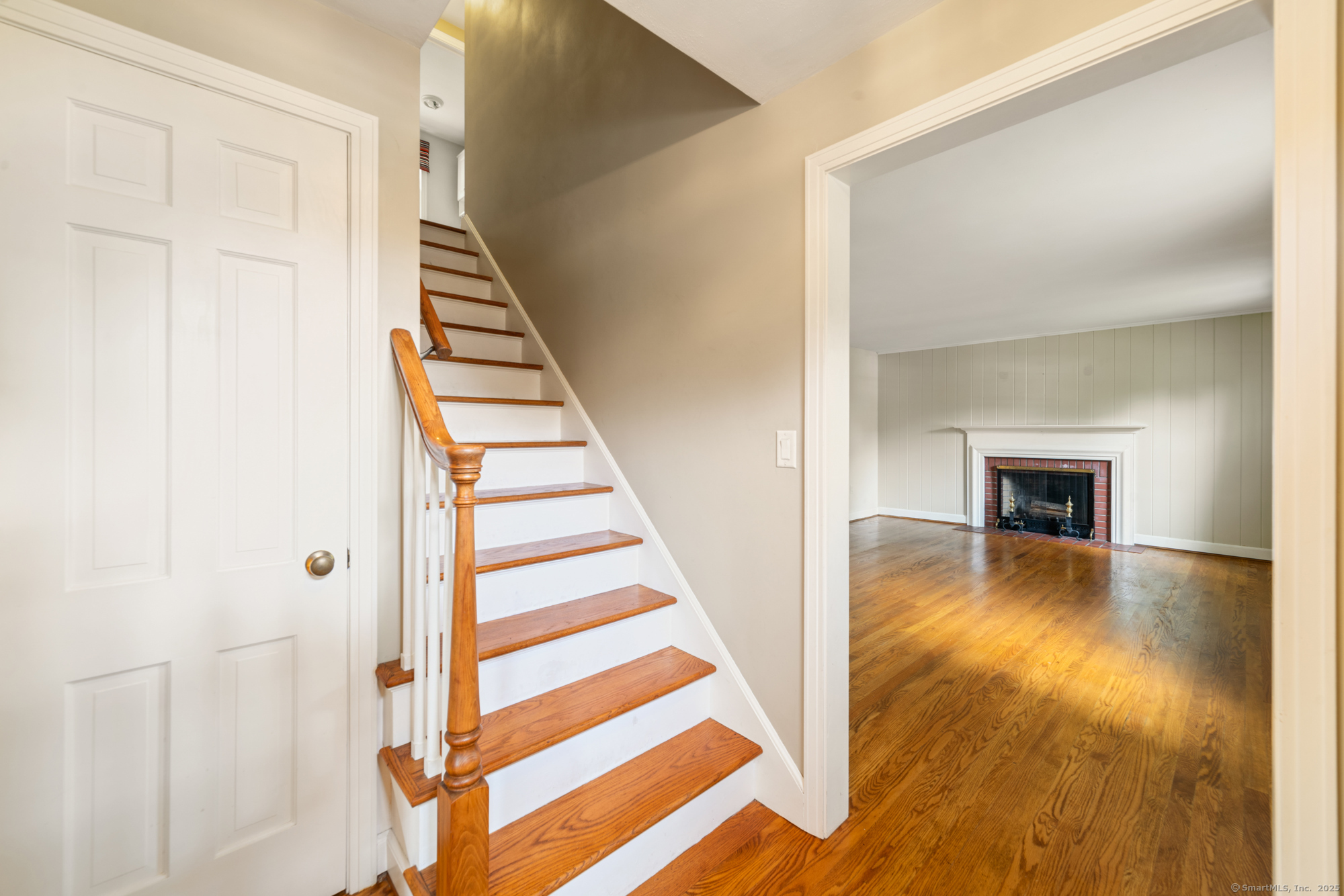 80 Dryden Drive Meriden, CT 06450 - Photo 8 of 23 a view of a livingroom with wooden floor and stairs