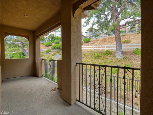 a view of hallway with a porch