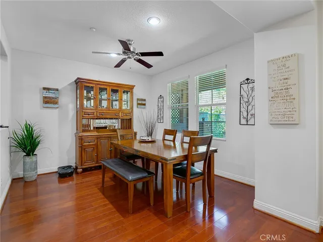 a view of a livingroom with furniture and a window