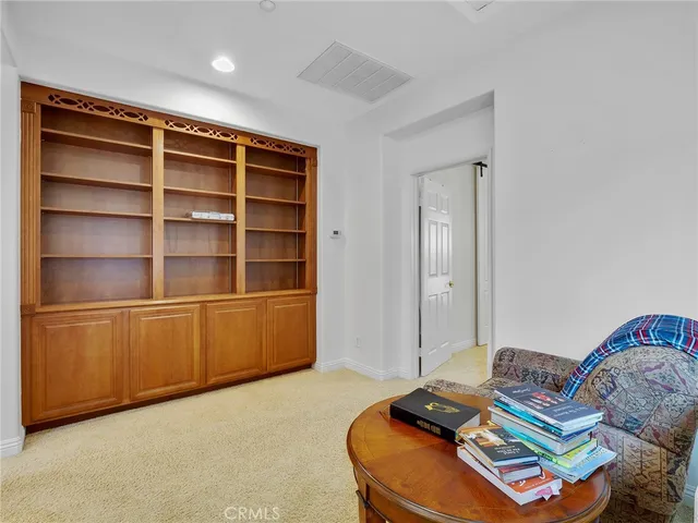 a bedroom with a bed and furniture