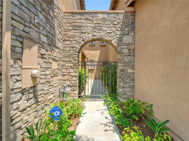 a stone house with a outdoor space
