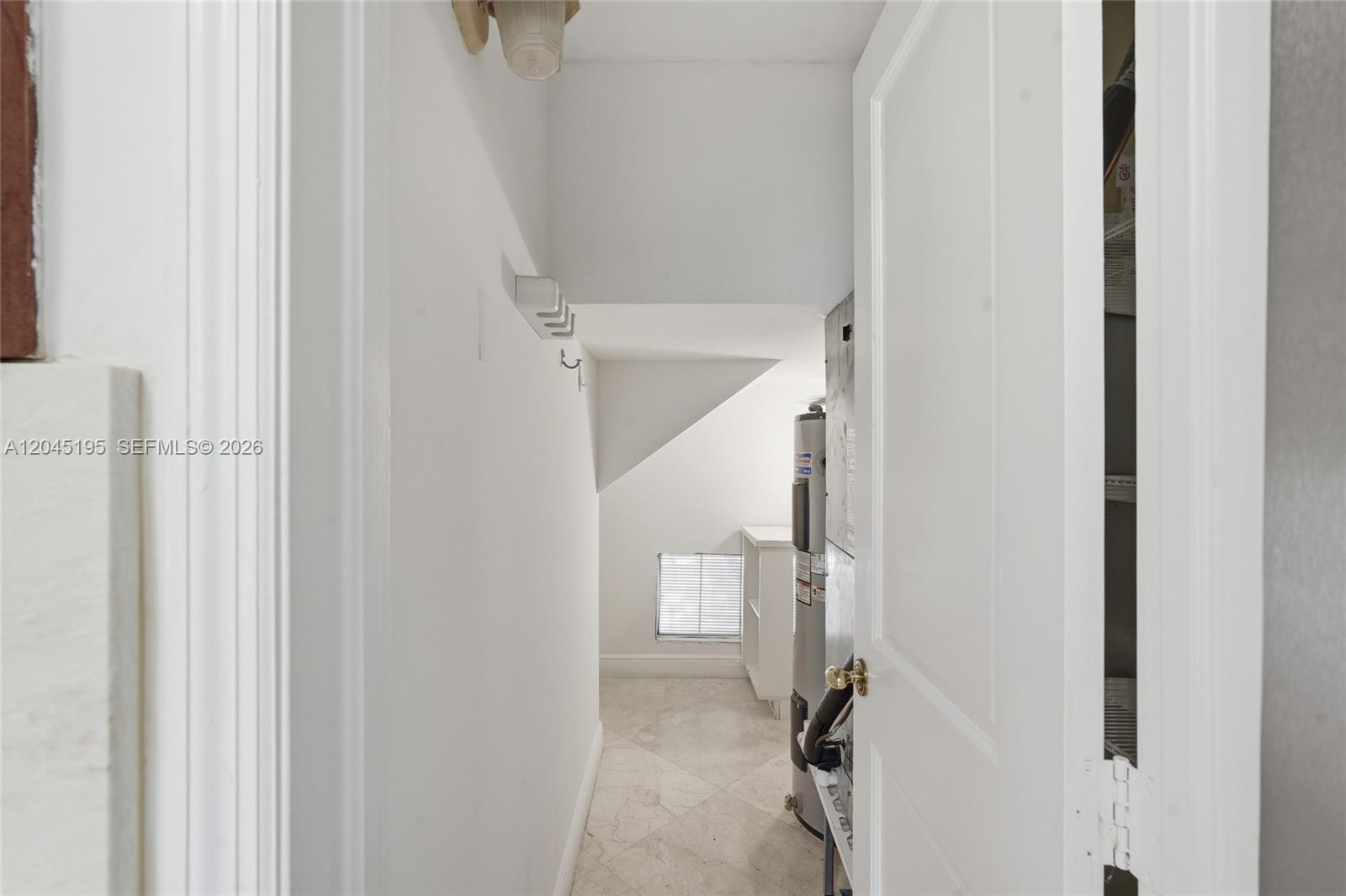592 Fernwood Road, Unit B Key Biscayne, FL 33149 - Photo 13 of 36 Storage next to kitchen