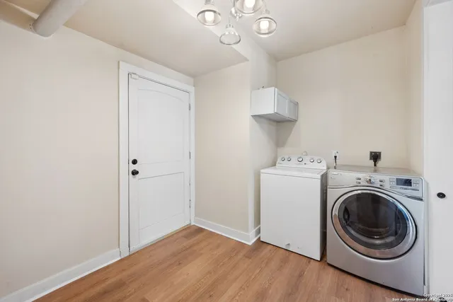 a view of a storage & utility room with washer and dryer