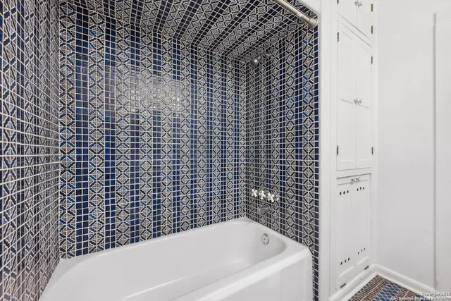 a bathroom with a bathtub