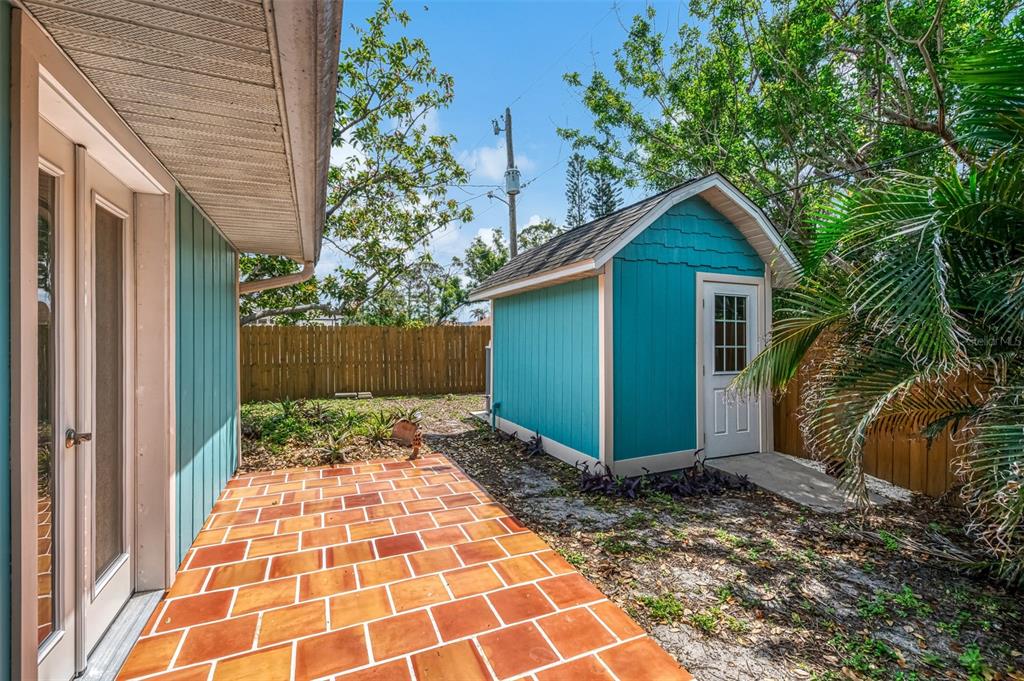 1137 Ponderosa Road Venice, FL 34293 - Photo 39 of 48 a view of a backyard with plants