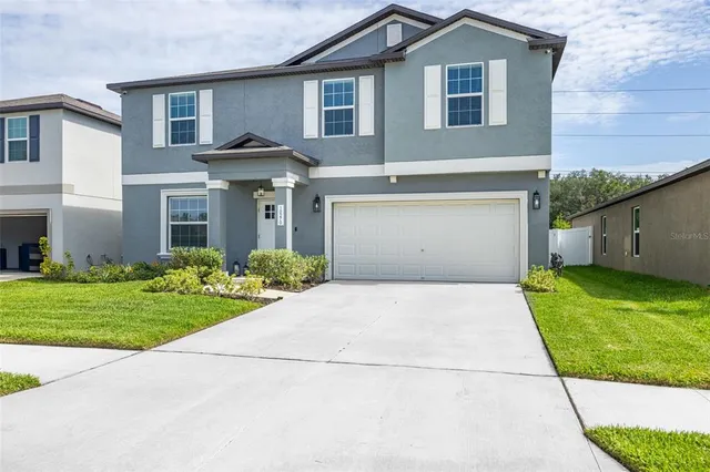 a front view of house with yard