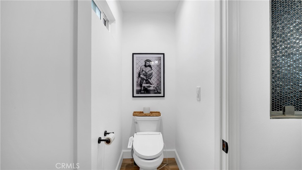 16281 Golden Gate Lane Huntington Beach, CA 92649 - Photo 15 of 22 a bathroom with a toilet