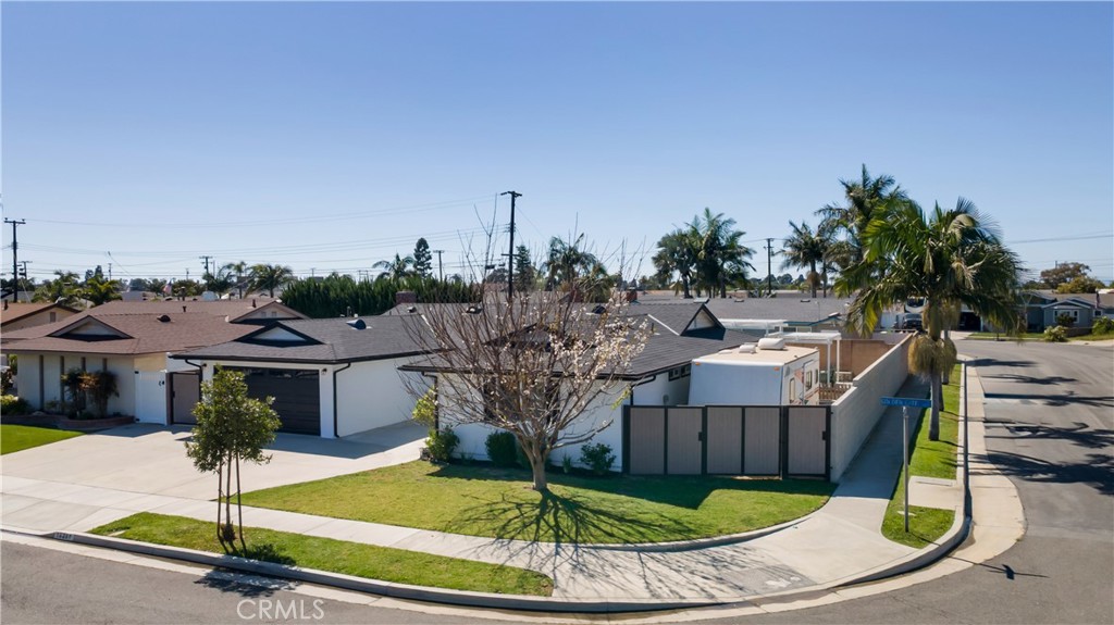 16281 Golden Gate Lane Huntington Beach, CA 92649 - Photo 2 of 22 a view of a house with entertaining space
