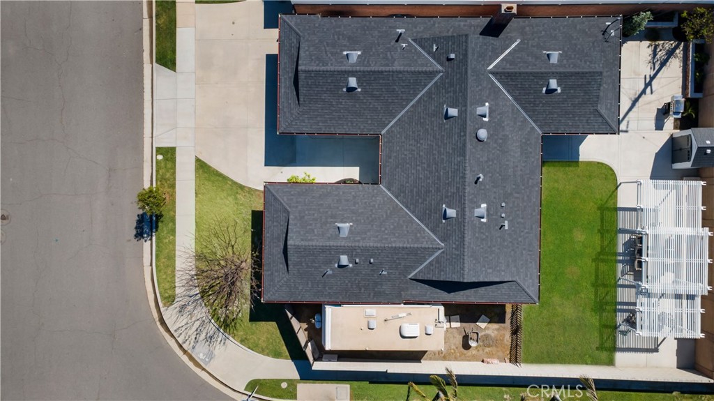 16281 Golden Gate Lane Huntington Beach, CA 92649 - Photo 3 of 22 an aerial view of houses with a yard