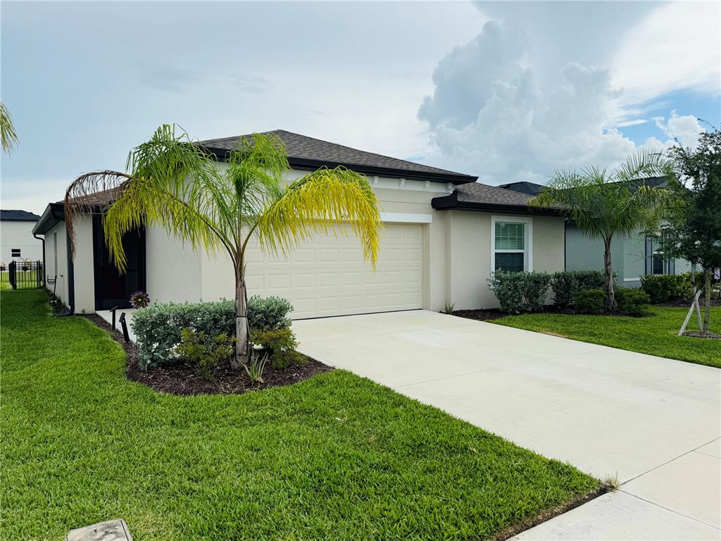 4034 San Clemente Court North Fort Myers, FL 33917 - Photo 2 of 22 a house view with a garden space