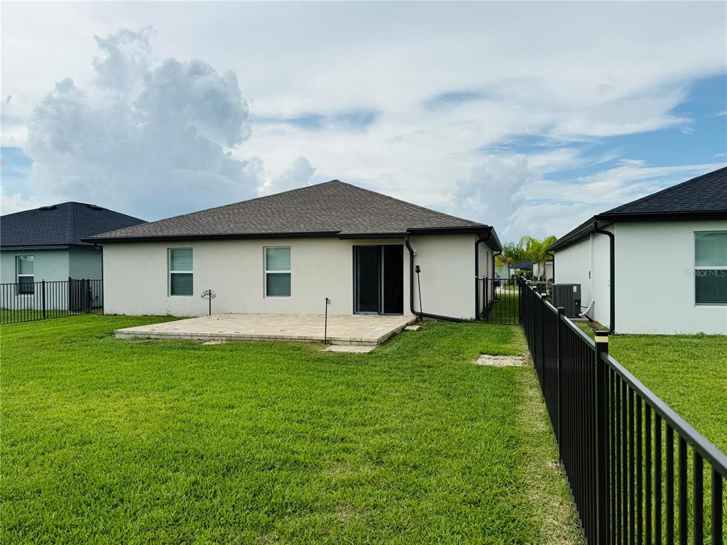4034 San Clemente Court North Fort Myers, FL 33917 - Photo 6 of 22 a front view of house with yard and green space