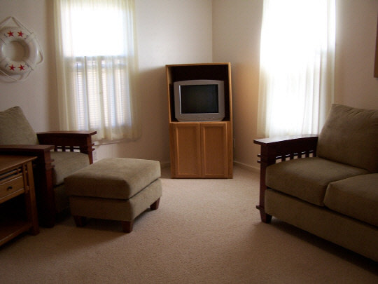 2591 South Snyder Road Oregon, IL 61061 - Photo 3 of 7 a living room with furniture and a flat screen tv