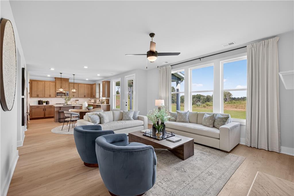 2600 Parkside Way Gainesville, GA 30507 - Photo 2 of 41 a living room with furniture and a large window