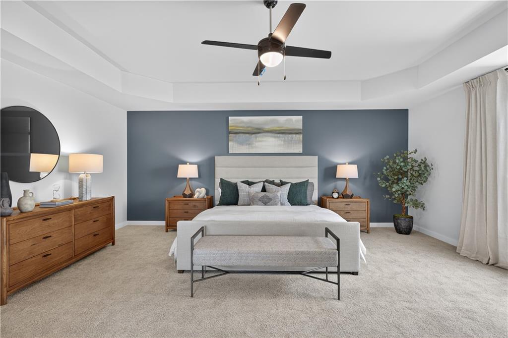 2600 Parkside Way Gainesville, GA 30507 - Photo 30 of 41 a bedroom with a bed and a potted plant