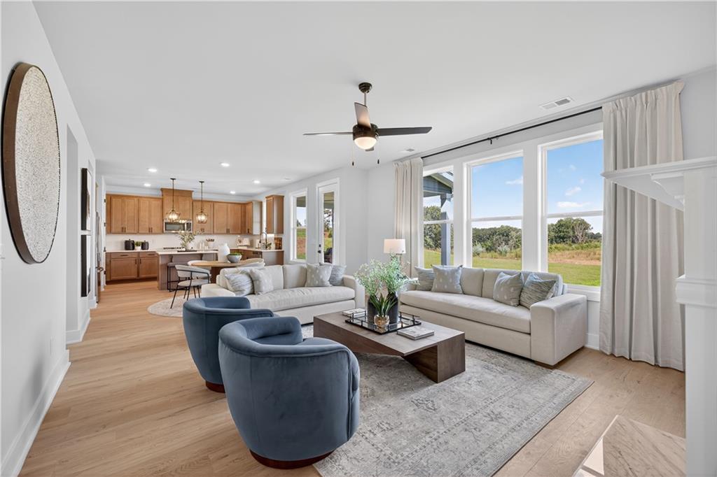 2600 Parkside Way Gainesville, GA 30507 - Photo 3 of 41 a living room with furniture and a large window