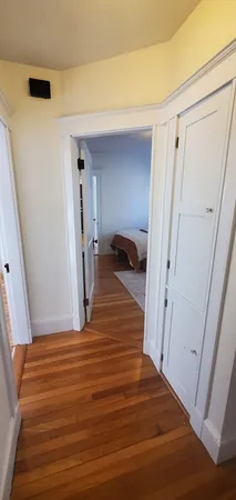 a view of a hallway view with staircase
