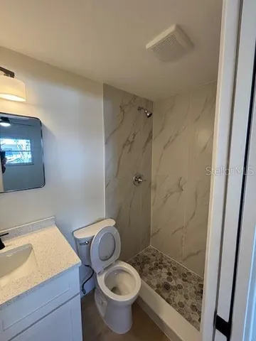 a bathroom with a sink and a toilet