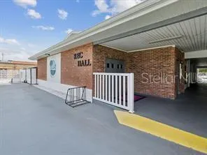 a view of a porch with furniture