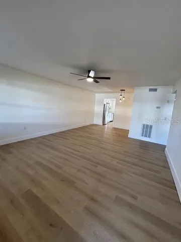 a view of a refrigerator in a room