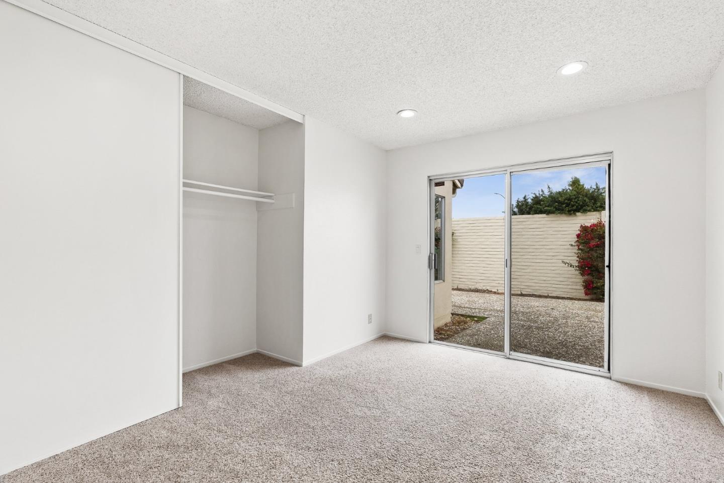 703 Sherman Circle Salinas, CA 93907 - Photo 11 of 25 a view of a refrigerator in kitchen and entryway