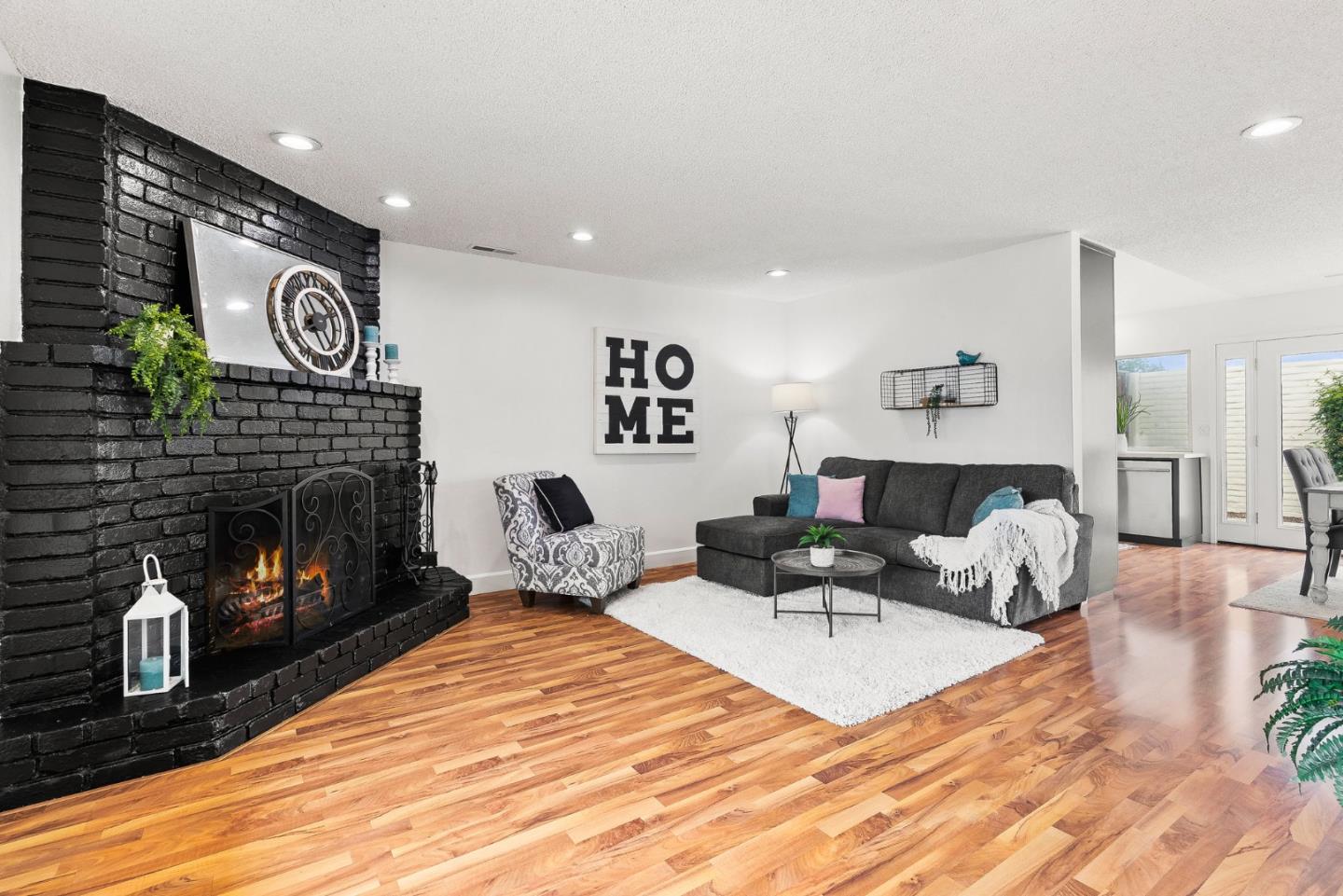 703 Sherman Circle Salinas, CA 93907 - Photo 2 of 25 a living room with furniture and a fireplace