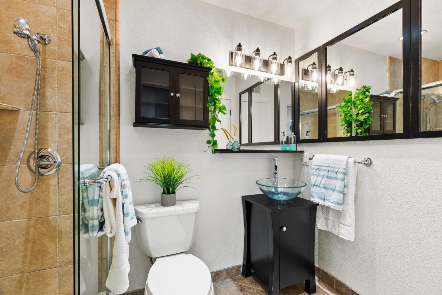 703 Sherman Circle Salinas, CA 93907 - Photo 9 of 25 a bathroom with a sink mirror and vanity