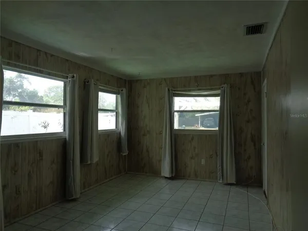a view of hallway with windows