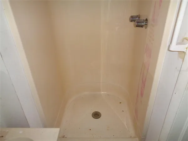 a bathroom with a granite countertop sink