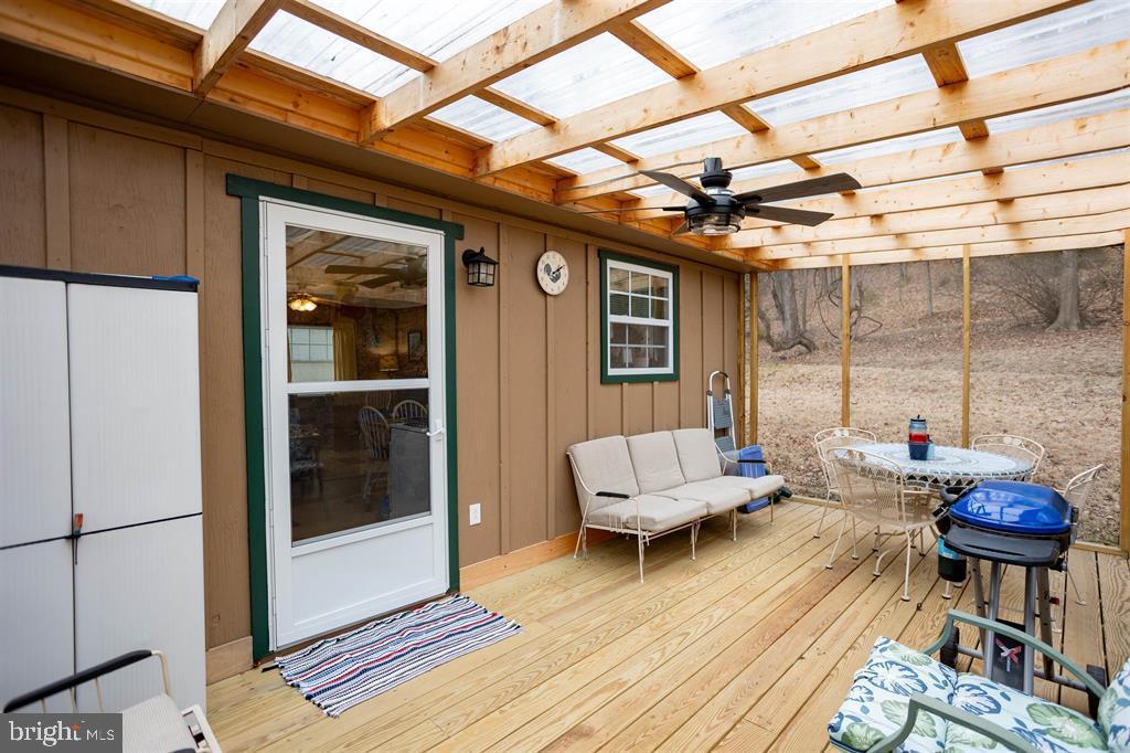 49 Mount Top Road Baker, WV 26801 - Photo 23 of 34 a outdoor space with patio furniture and potted plants