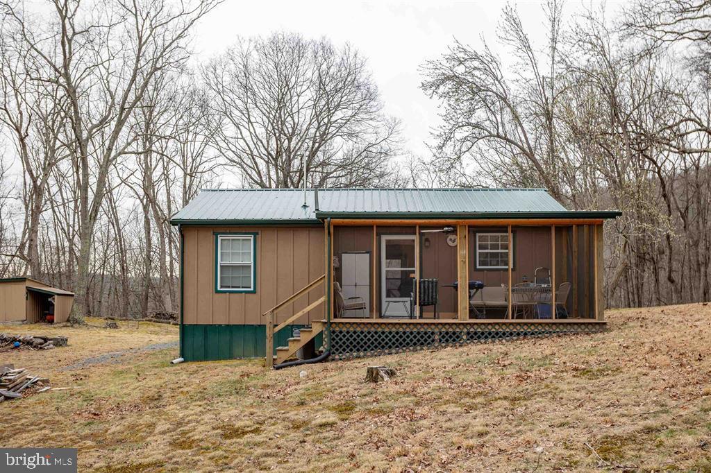 49 Mount Top Road Baker, WV 26801 - Photo 26 of 34 a house with a outdoor space
