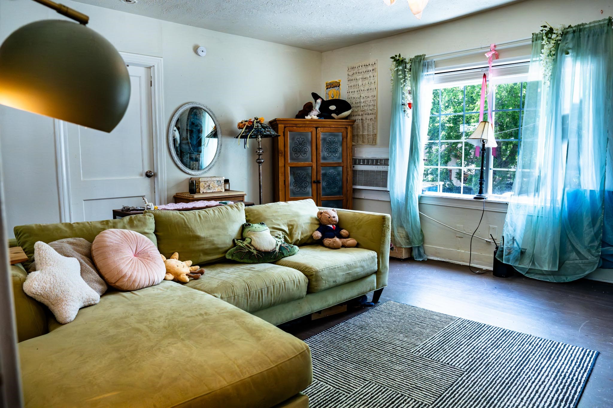 1909 Colquitt Street, Unit 7 Houston, TX 77098 - Photo 7 of 17 a living room with furniture and a large window