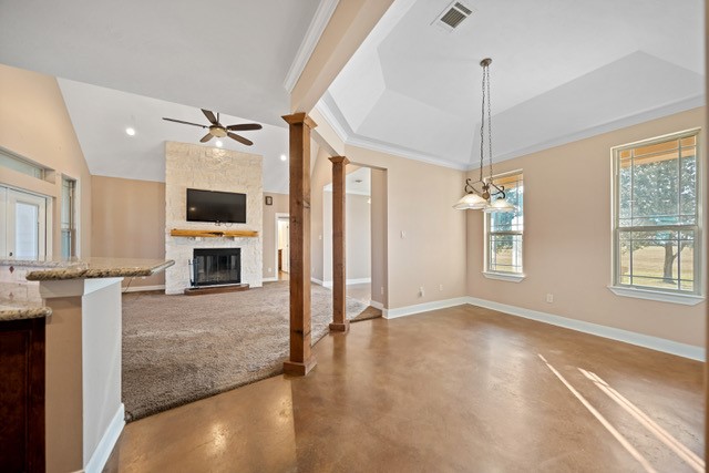 26752 Nelson Road Hempstead, TX 77445 - Photo 8 of 45 The open layout connects the living and dining areas seamlessly, with wood columns providing subtle definition while preserving an airy feel.
