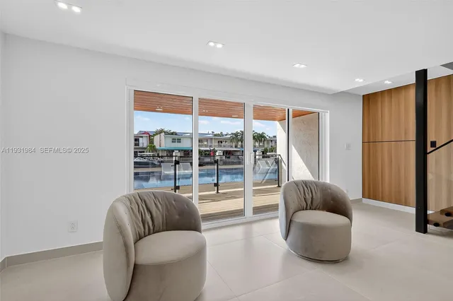 a view of a balcony with chairs