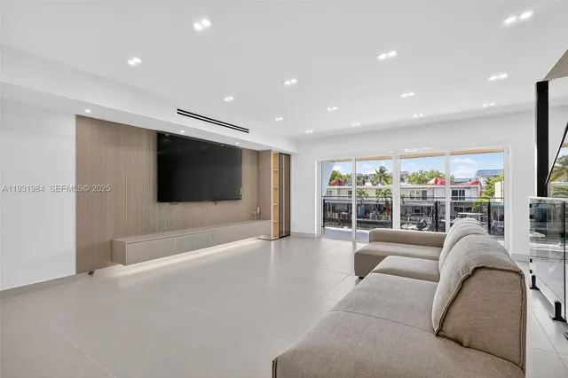 a kitchen with stainless steel appliances a refrigerator and a sink