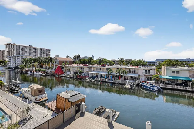 a view of a swimming pool with a lounge chairs
