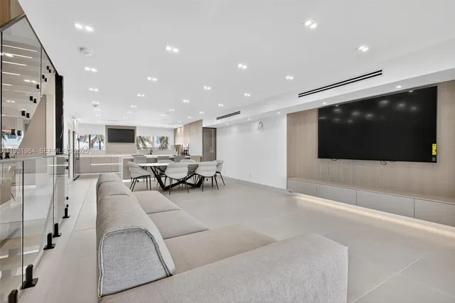 a view of a hallway with wooden shelves