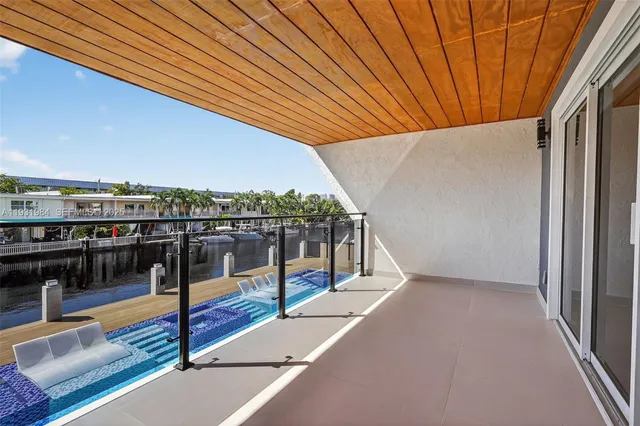 a bathroom with a tub and shower