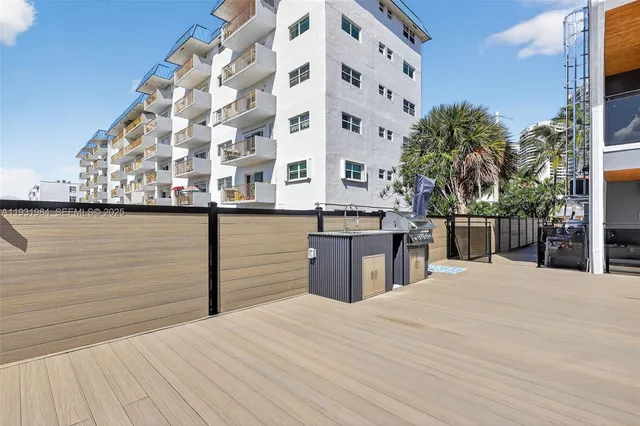 a view of a car park in front of a building