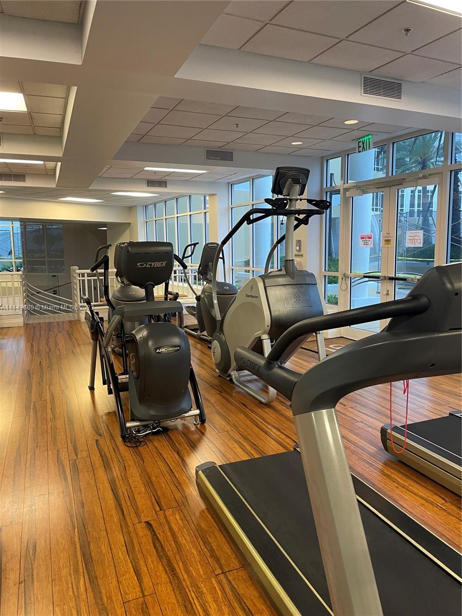 Brickell Key Miami, FL 33131 - Photo 25 of 40 a view of a room with gym equipment