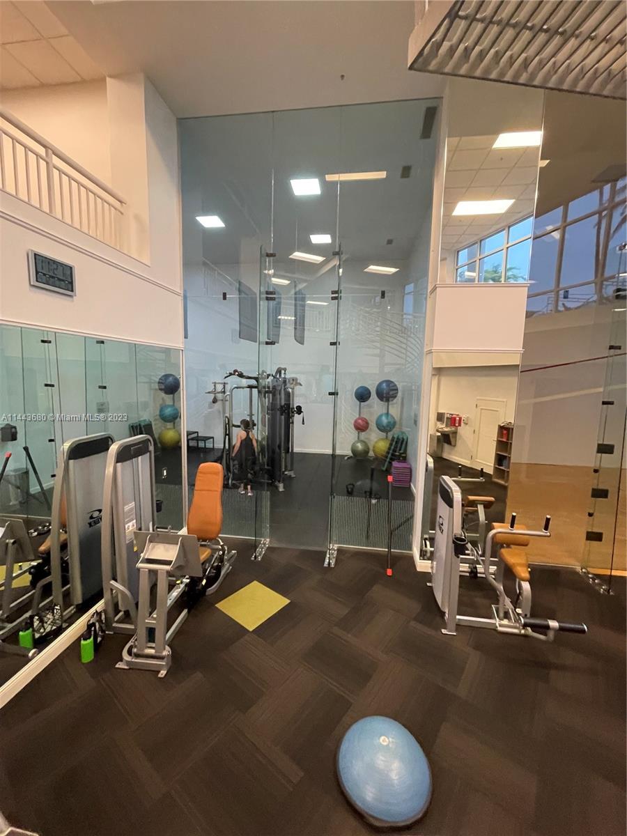 Brickell Key Miami, FL 33131 - Photo 34 of 40 a view of a room with gym equipment