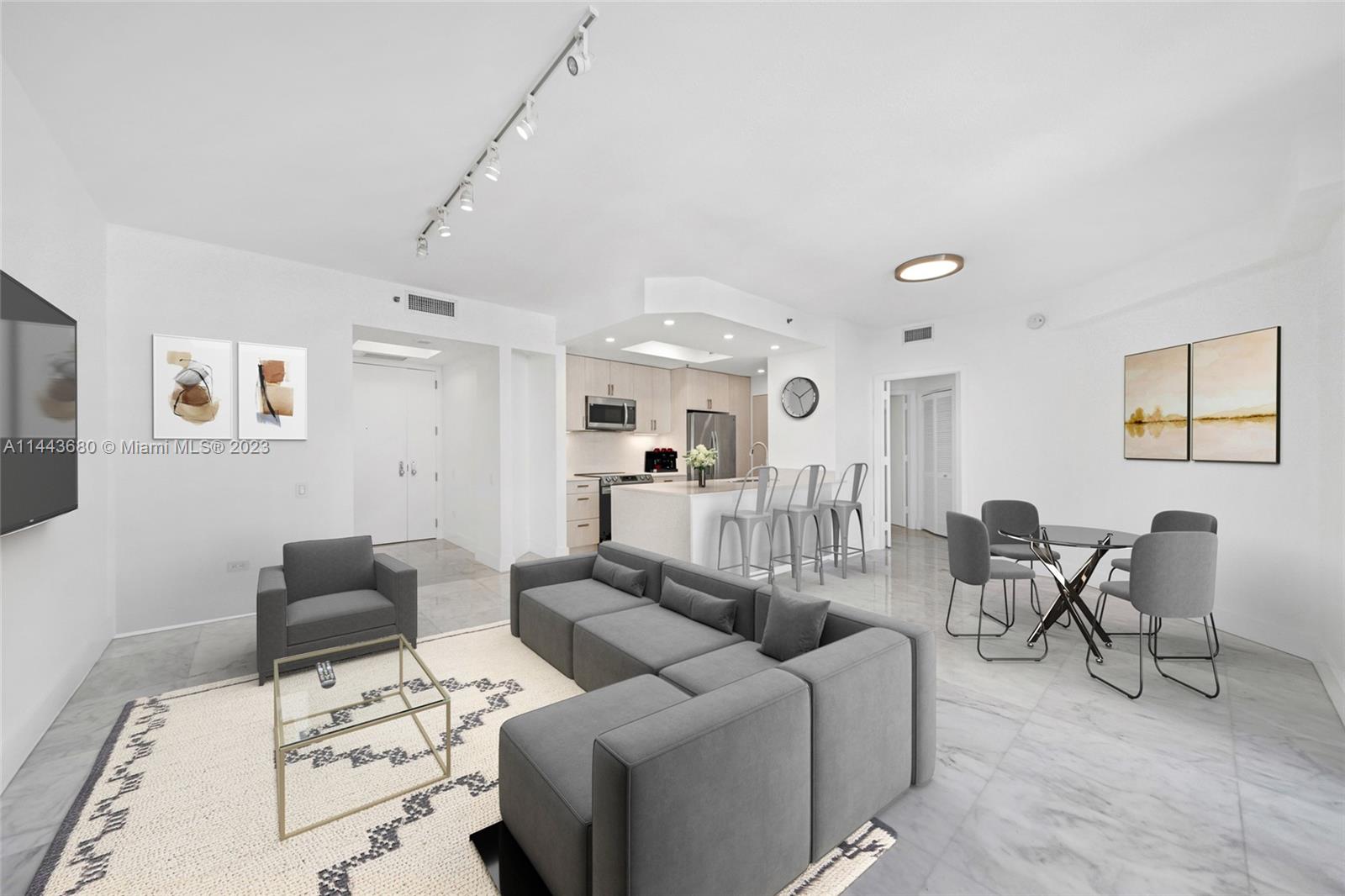 Brickell Key Miami, FL 33131 - Photo 4 of 40 a living room with furniture and a couch