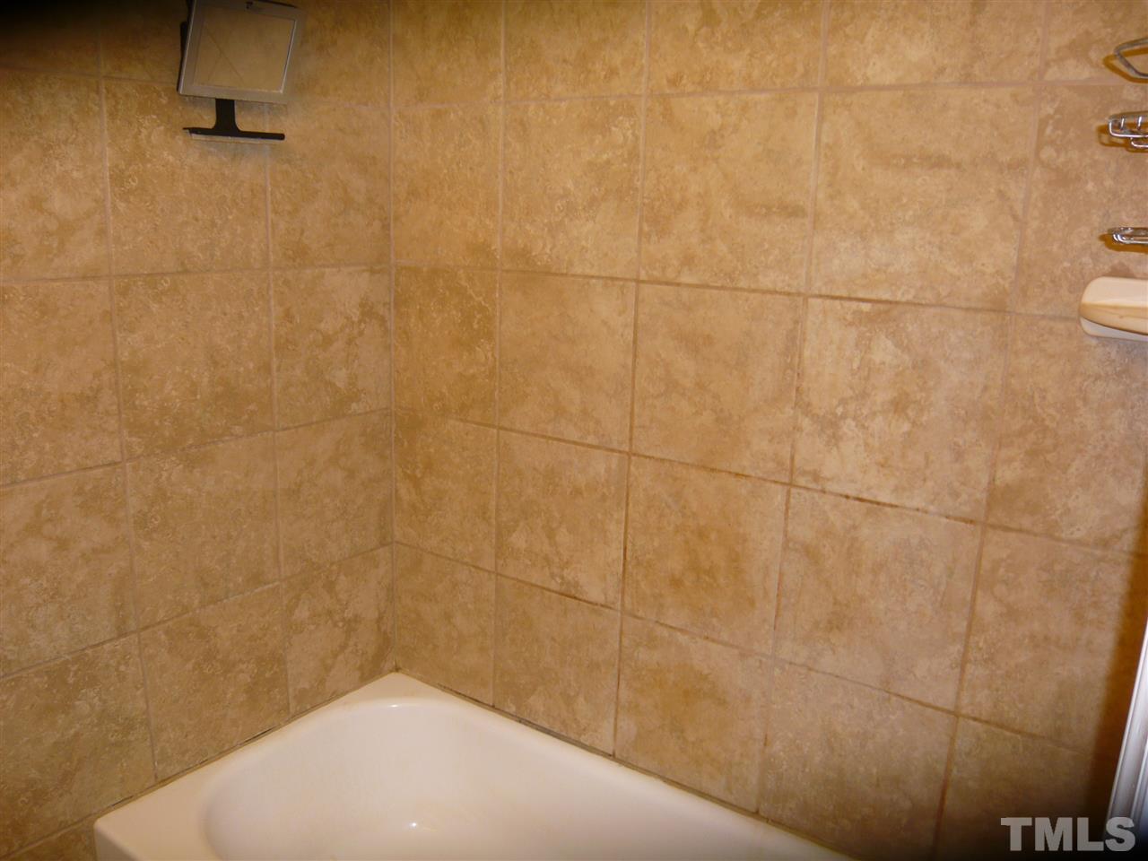 4613 Auburn Knightdale Road Raleigh, NC 27610 - Photo 20 of 25 a bathroom with a shower