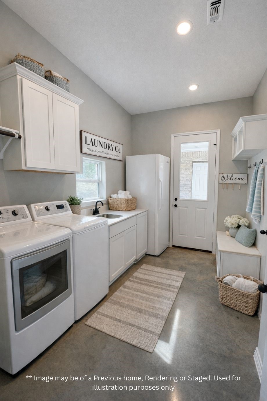 236 Dipping Vat Road Huntsville, TX 77340 - Photo 15 of 50 a utility room with cabinets washer and dryer