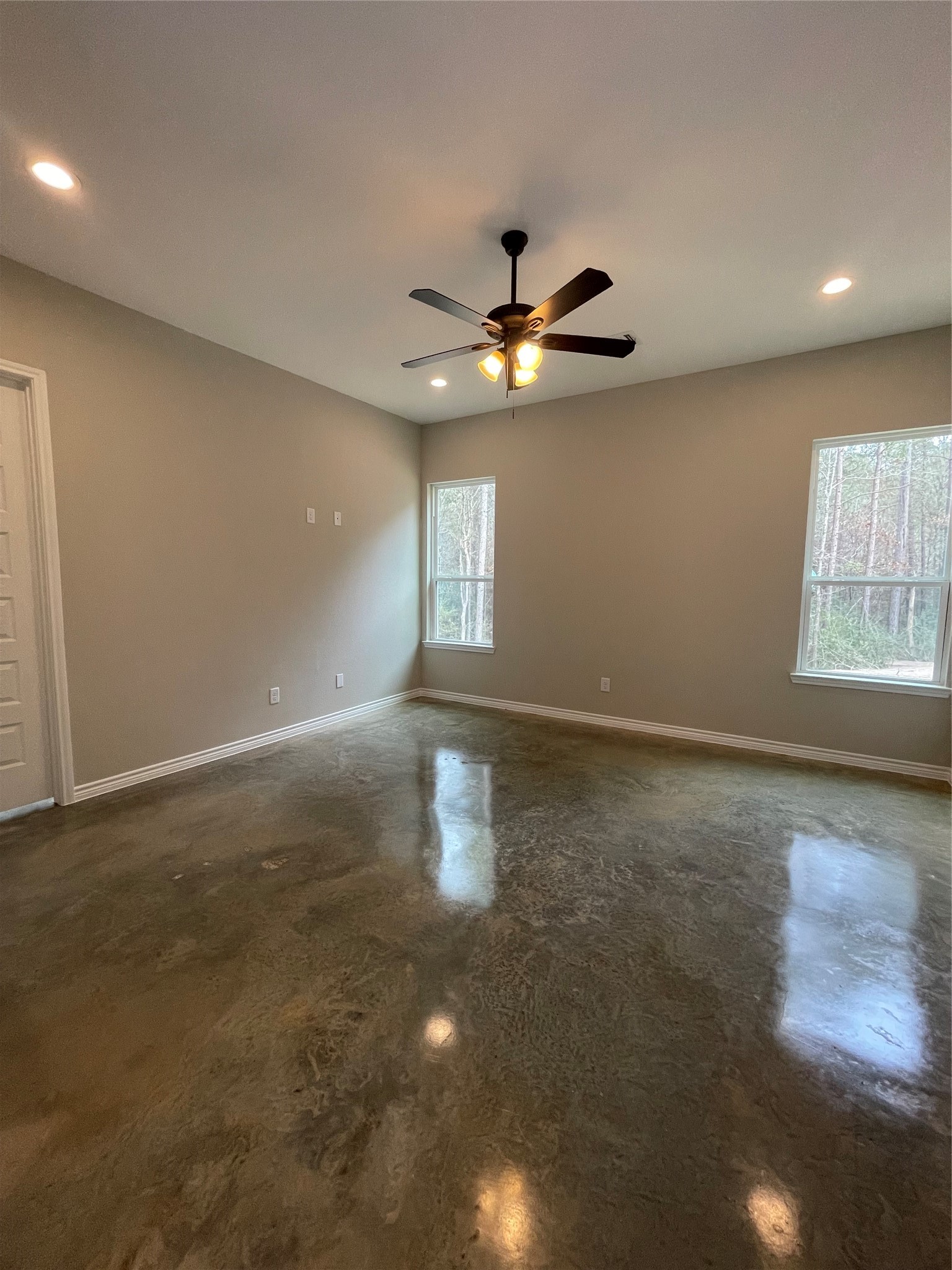 236 Dipping Vat Road Huntsville, TX 77340 - Photo 19 of 50 a view of an empty room with a window