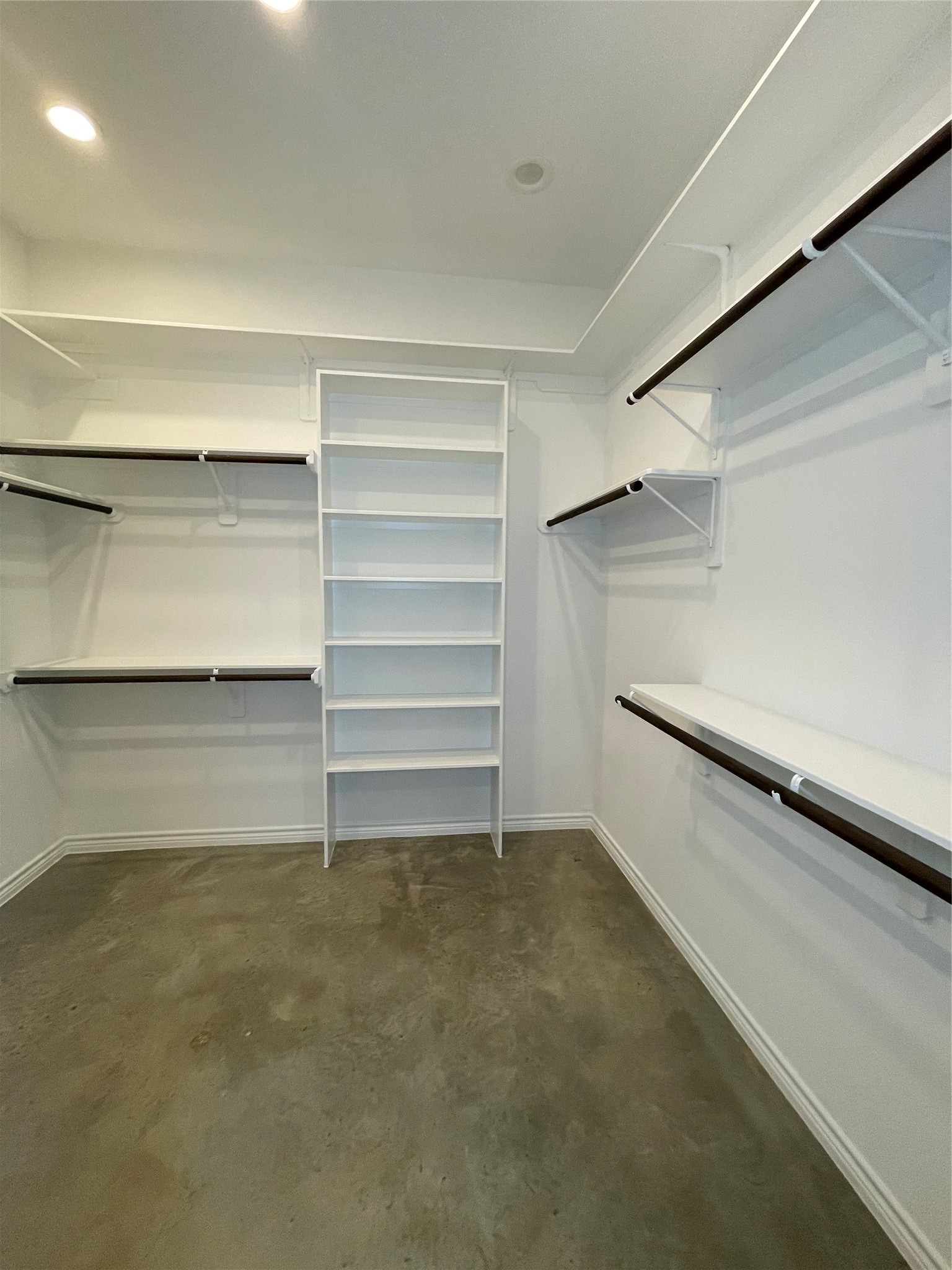 236 Dipping Vat Road Huntsville, TX 77340 - Photo 21 of 50 a view of an empty walk in closet
